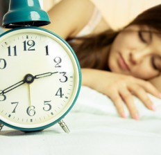 woman sleeping peacefully in bed 